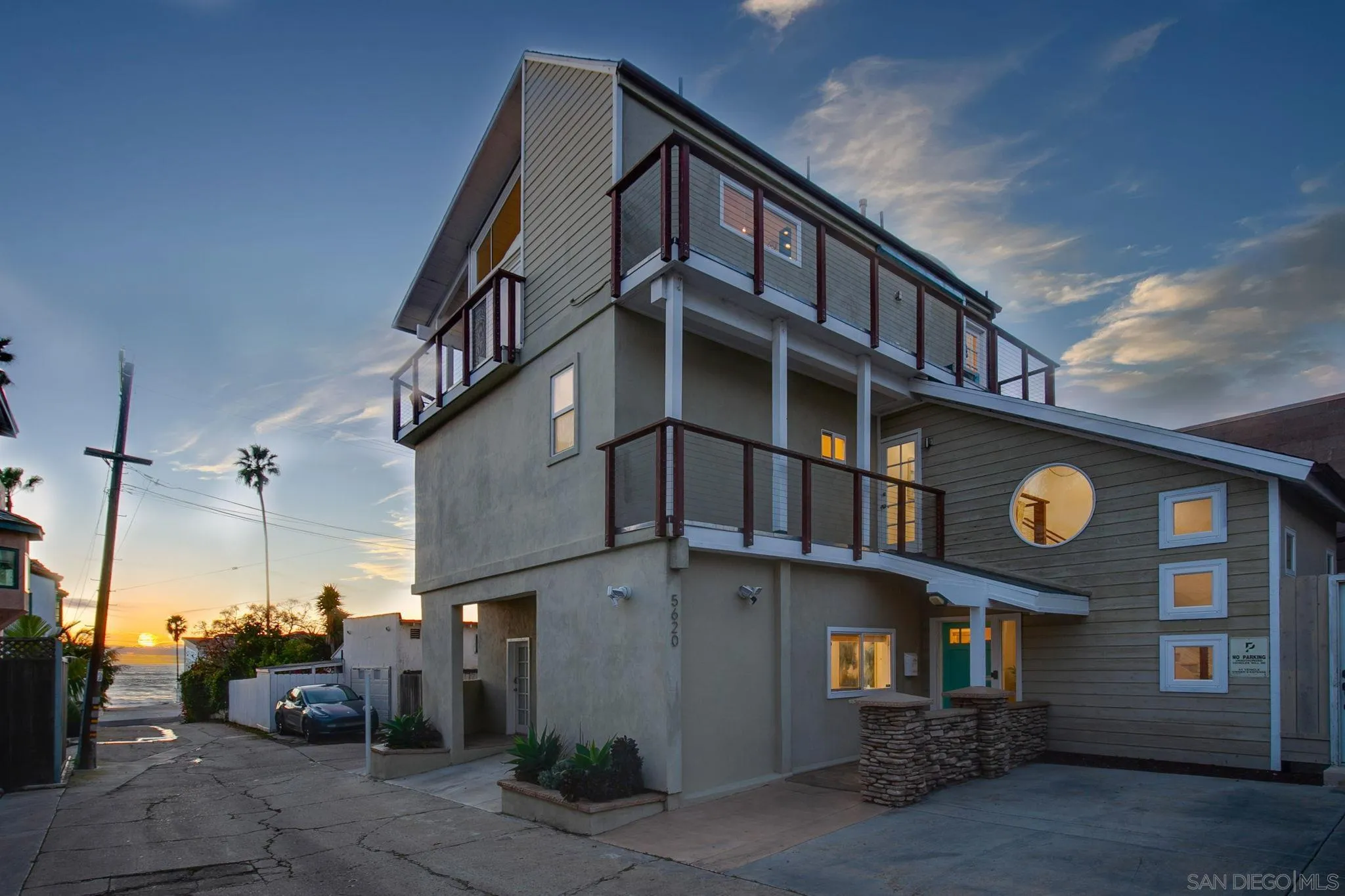 a street sign on a pole on a street