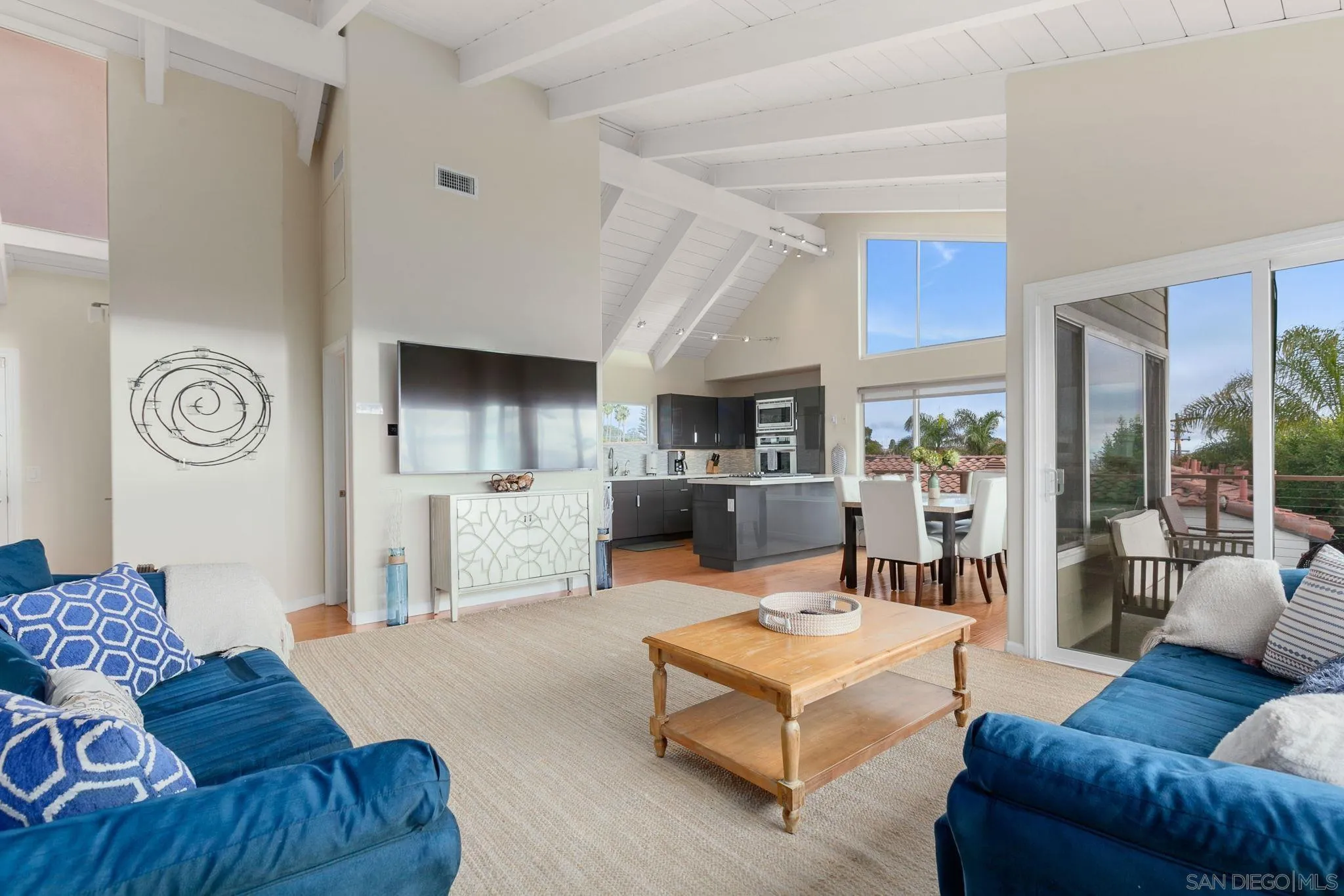 5620 La Jolla Boulevard La Jolla, CA 92037 - Photo 14 of 50 a living room with furniture and a large window
