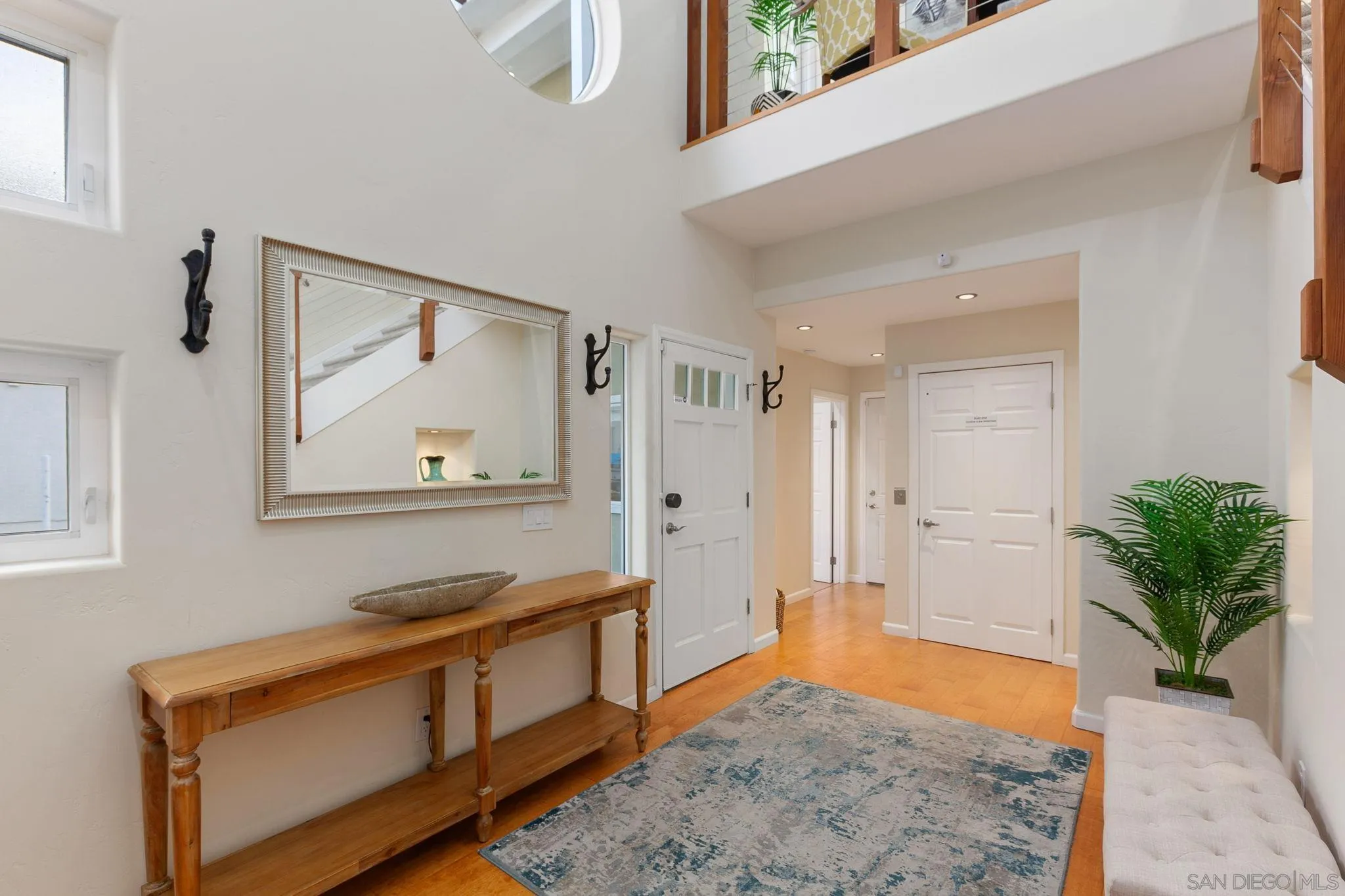 5620 La Jolla Boulevard La Jolla, CA 92037 - Photo 30 of 50 a spacious bathroom with a granite countertop sink and a mirror