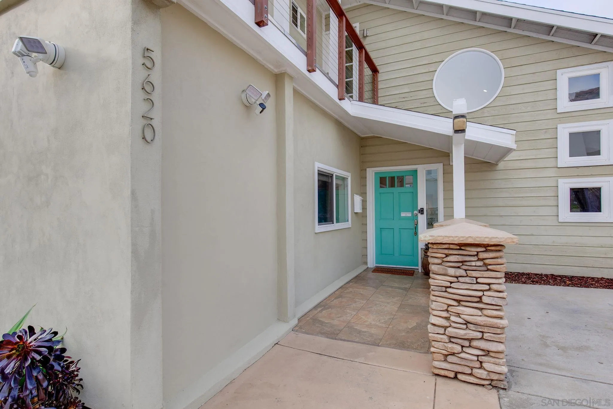 5620 La Jolla Boulevard La Jolla, CA 92037 - Photo 39 of 50 a bathroom with a sink and a mirror