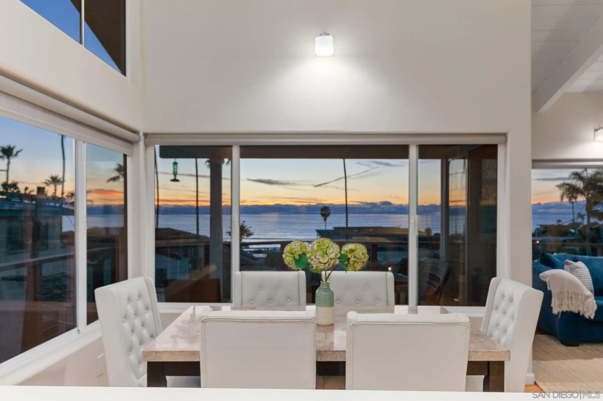 5620 La Jolla Boulevard La Jolla, CA 92037 - Photo 4 of 50 a living room with furniture and a floor to ceiling window