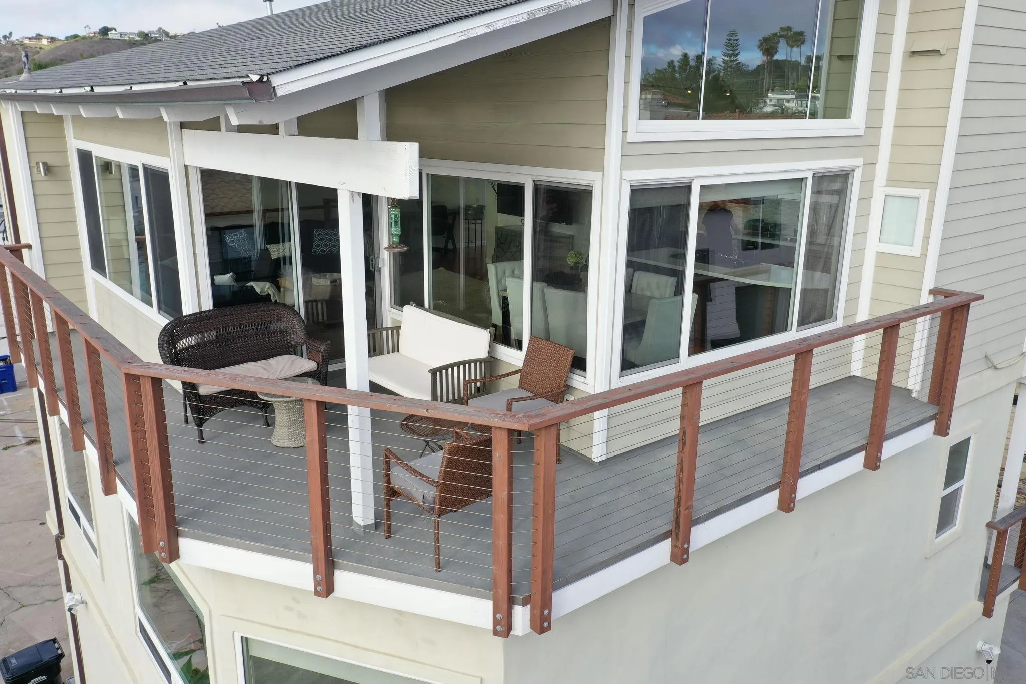 5620 La Jolla Boulevard La Jolla, CA 92037 - Photo 43 of 50 a view of a balcony with chair and the glass door