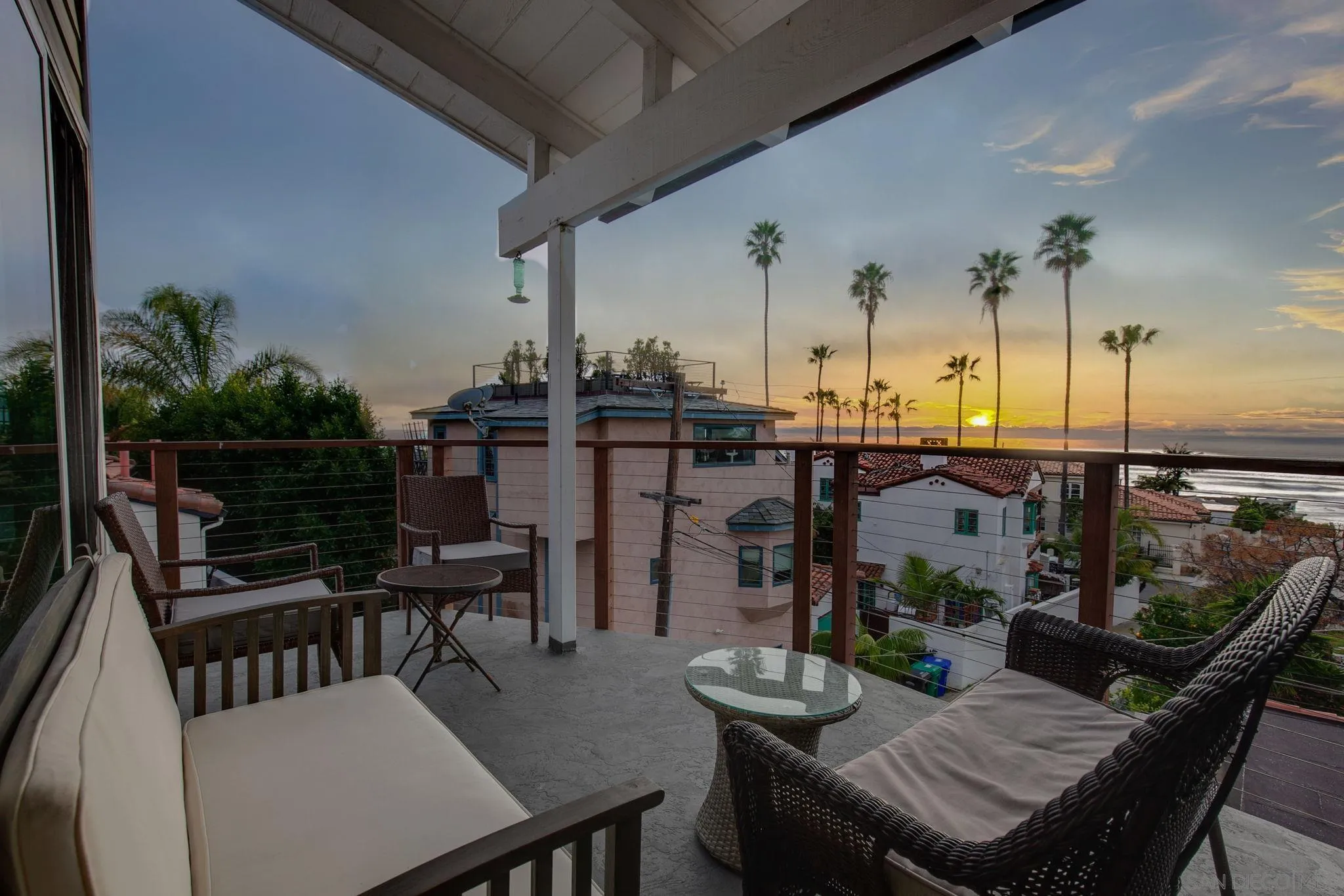 5620 La Jolla Boulevard La Jolla, CA 92037 - Photo 8 of 50 a view of a balcony and chairs