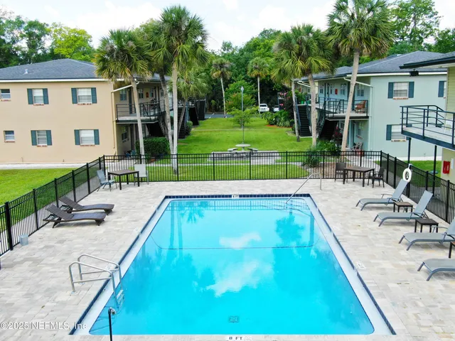 a view of a house with a swimming pool
