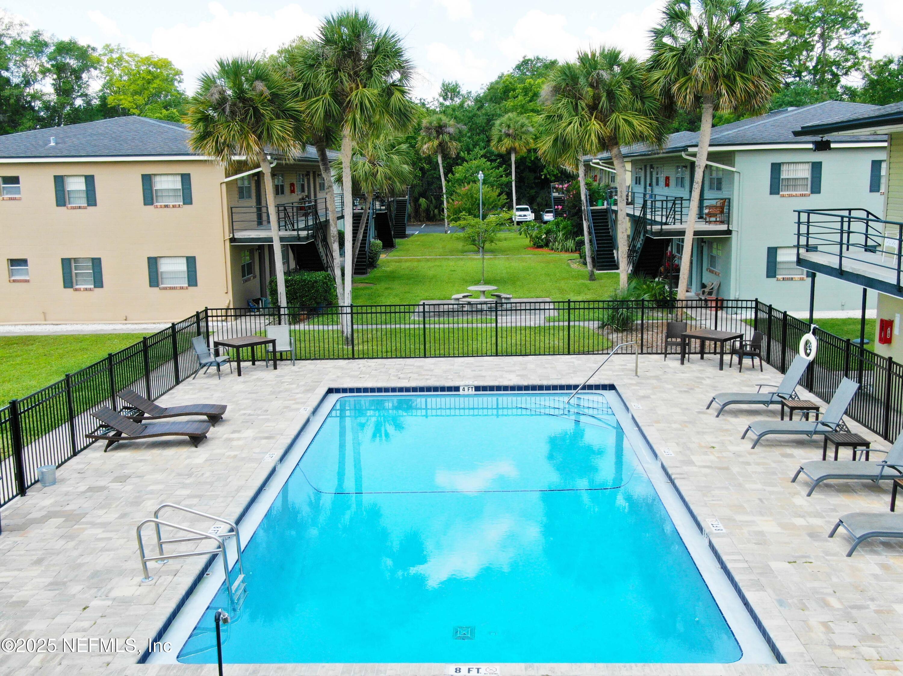 a view of a house with a swimming pool