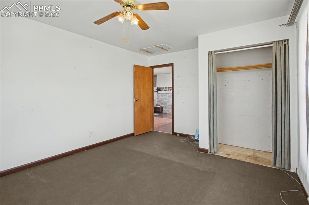12380 Old Barn Road Elbert, CO 80106 - Photo 11 of 42 wooden floor in an empty room