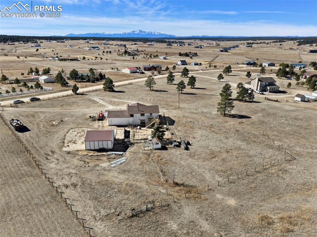 12380 Old Barn Road Elbert, CO 80106 - Photo 2 of 42 an aerial view of a building with parking space