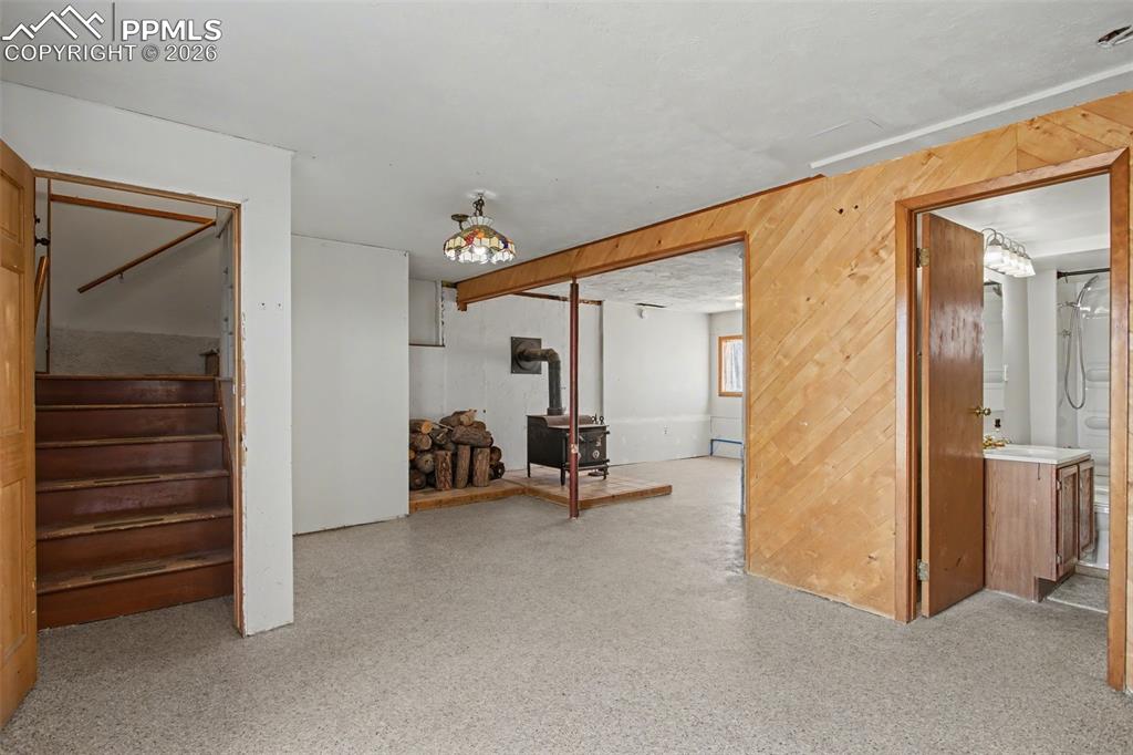 12380 Old Barn Road Elbert, CO 80106 - Photo 23 of 42 a view of a hallway with closet and furniture
