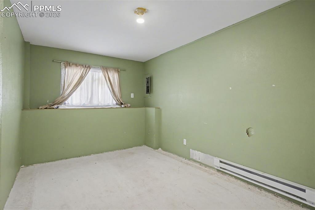 12380 Old Barn Road Elbert, CO 80106 - Photo 27 of 42 a room with a window and a fan