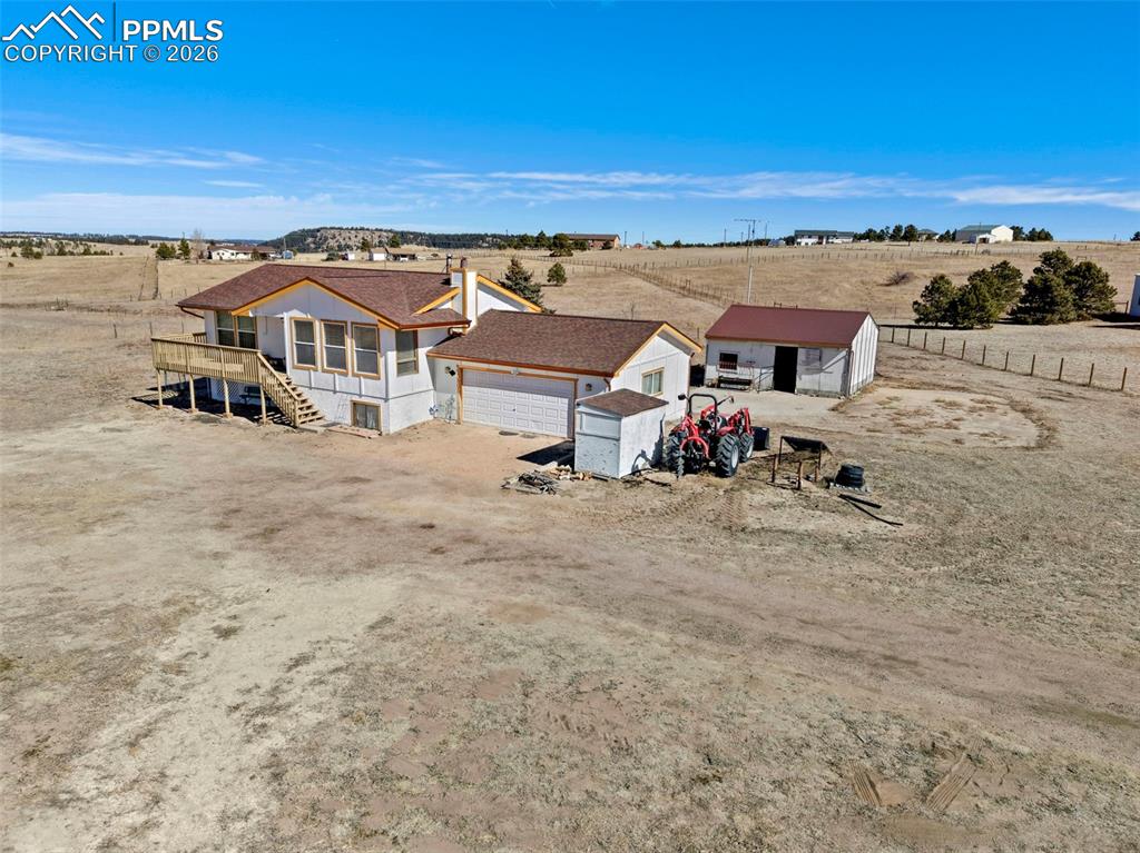 12380 Old Barn Road Elbert, CO 80106 - Photo 37 of 42 an aerial view of residential houses with outdoor space