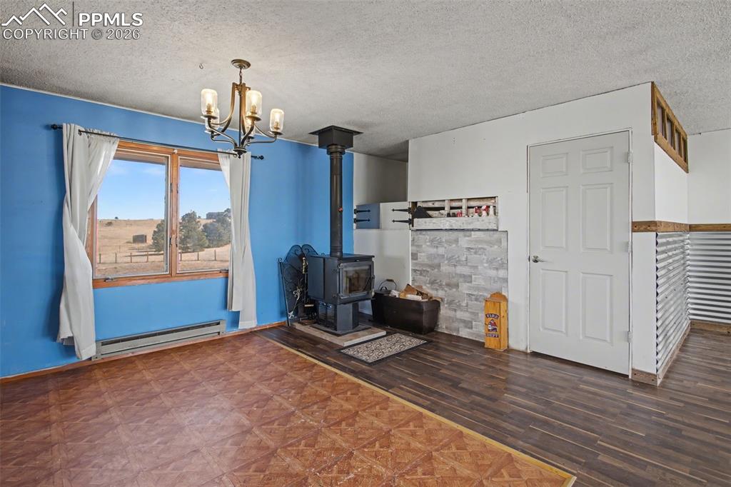 12380 Old Barn Road Elbert, CO 80106 - Photo 6 of 42 a view of a livingroom with furniture and window