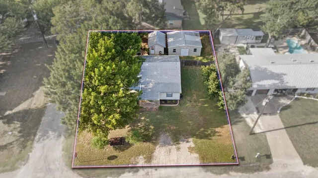 a view of a back yard of the house