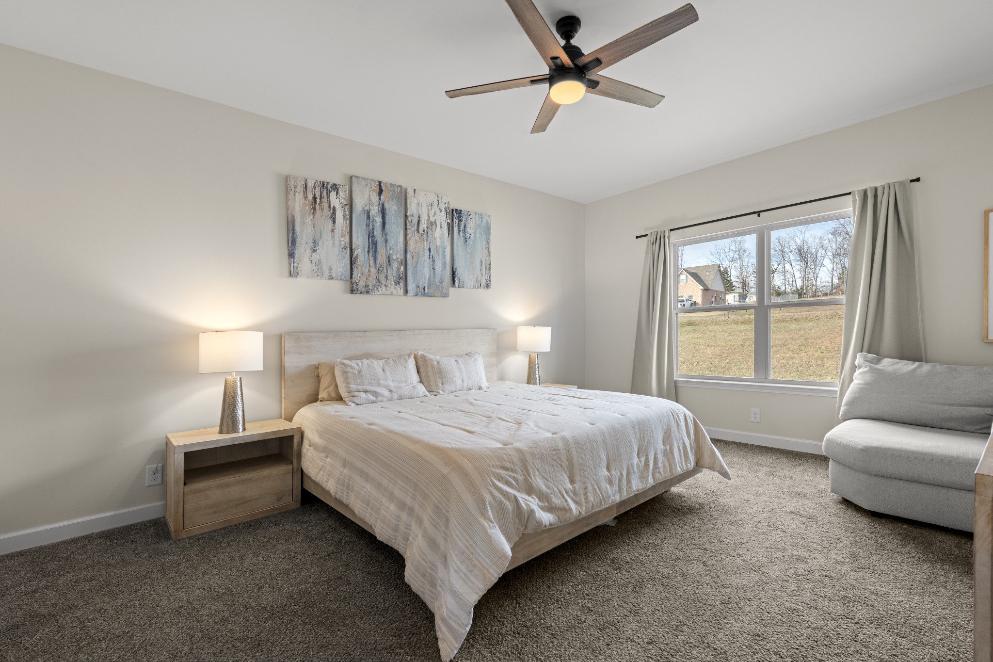 1007 Edgewood Drive Dickson, TN 37055 - Photo 11 of 25 a bedroom with a bed a couch and a window