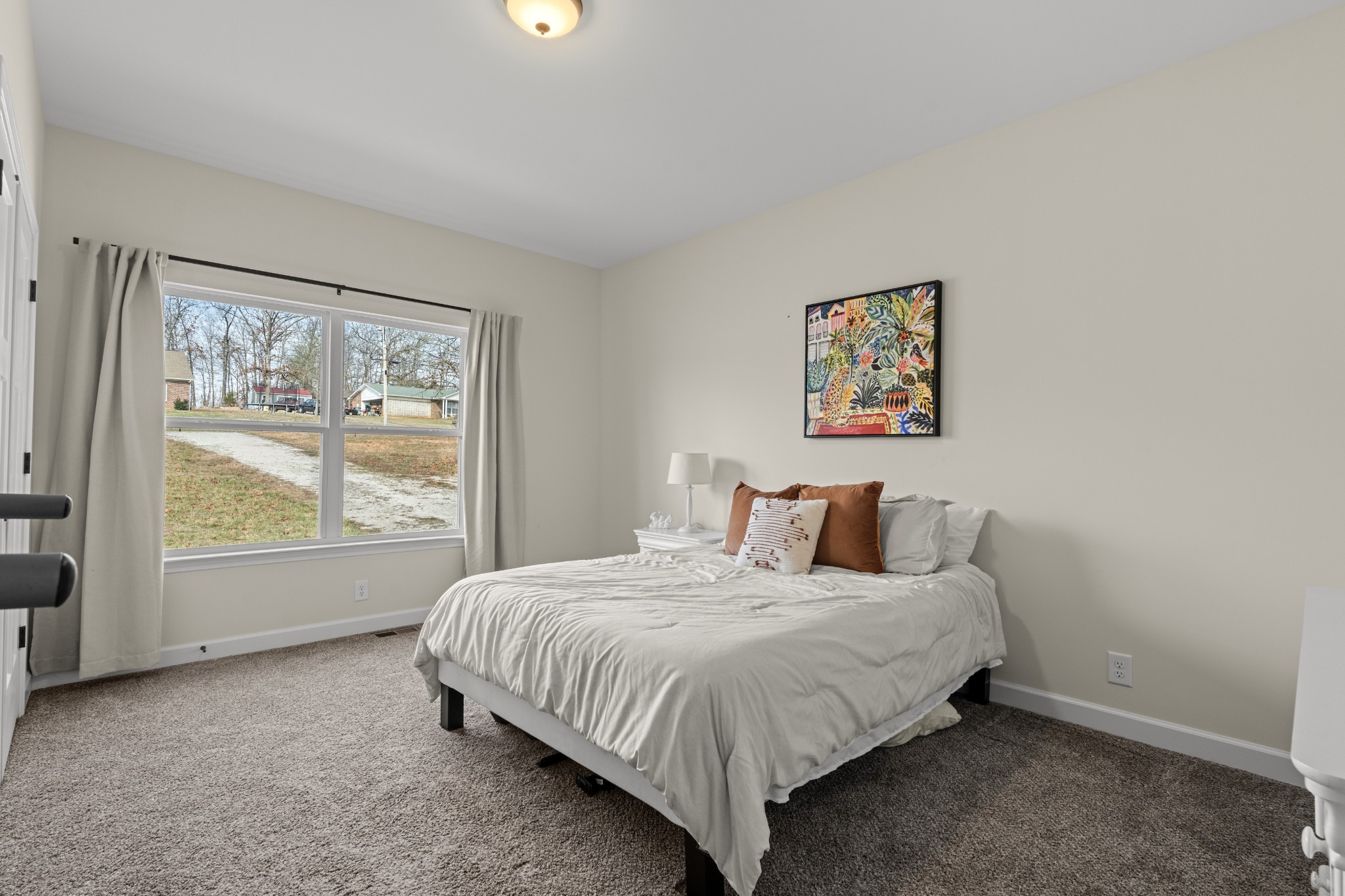 1007 Edgewood Drive Dickson, TN 37055 - Photo 14 of 25 a bedroom with a bed and a window