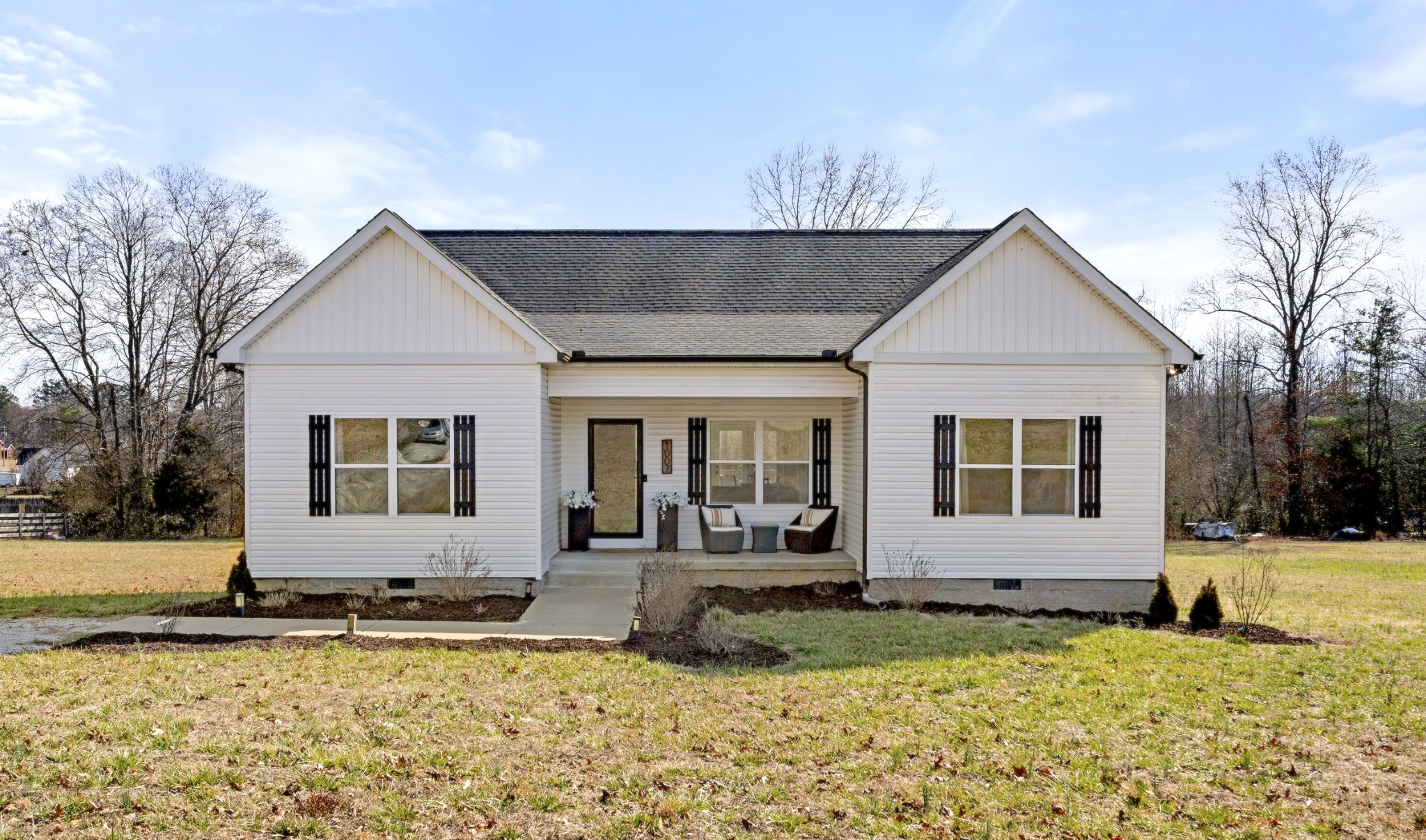 1007 Edgewood Drive Dickson, TN 37055 - Photo 2 of 25 a front view of a house with garden