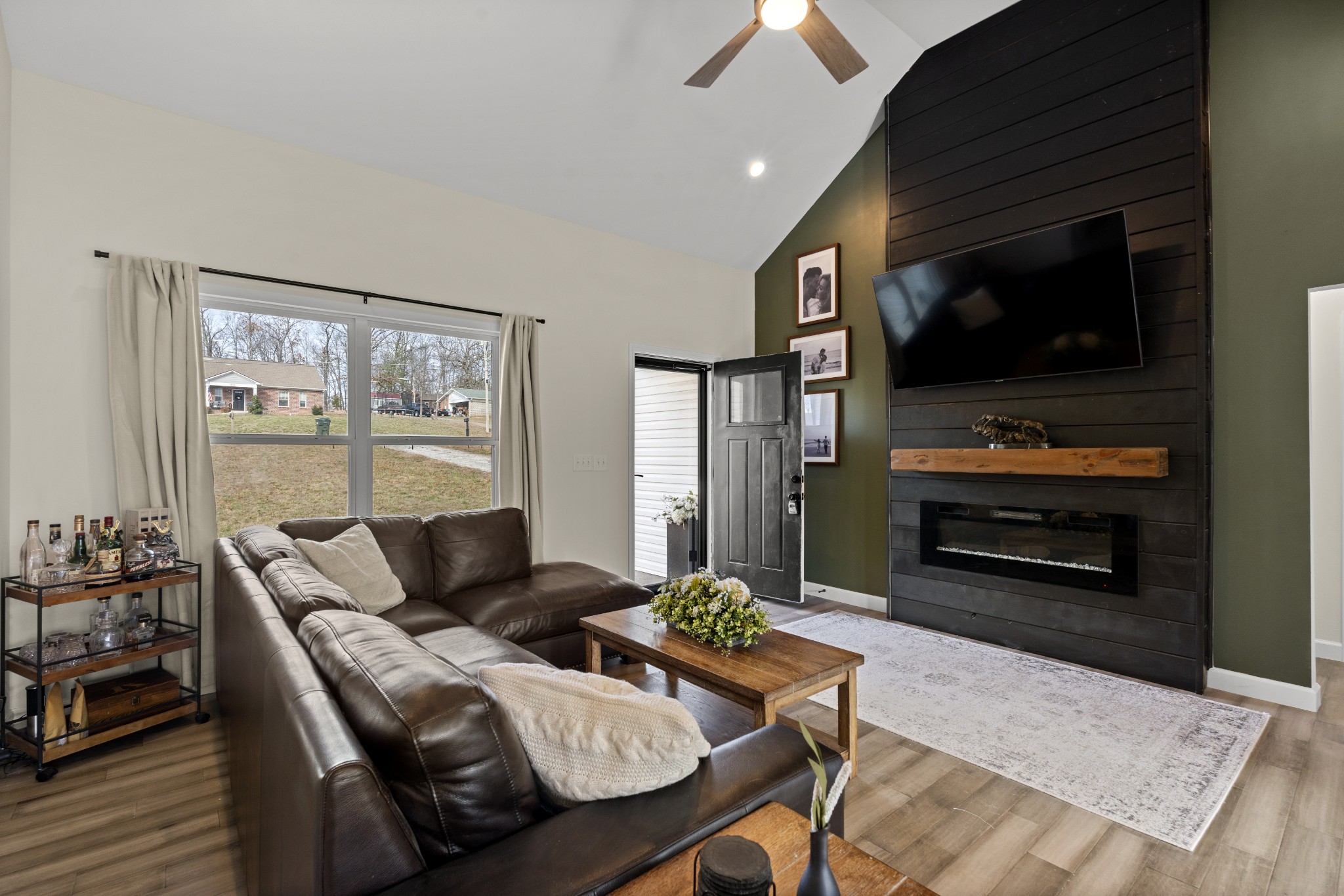 1007 Edgewood Drive Dickson, TN 37055 - Photo 5 of 25 a living room with furniture and a flat screen tv