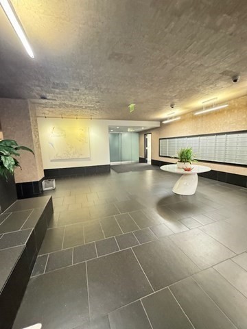 141 Dorchester Avenue, Unit 806 Boston, MA 02127 - Photo 12 of 12 a dining room with a table and chairs