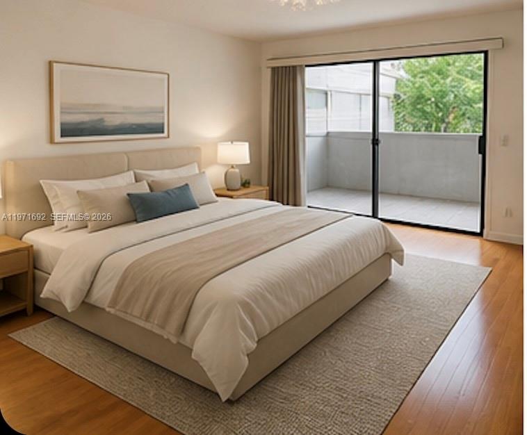 9001 Southwest 94th Street, Unit 113 Miami, FL 33176 - Photo 7 of 16 a bedroom with a large bed and a large window