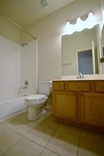25202 Diamond Ranch Drive Katy, TX 77494 - Photo 10 of 13 a bathroom with a toilet sink and mirror