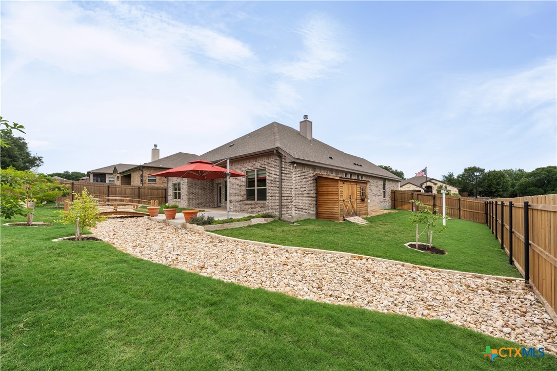 3405 Waggoner Drive Belton, TX 76513 - Photo 44 of 48 a aerial view of a house next to a yard and road