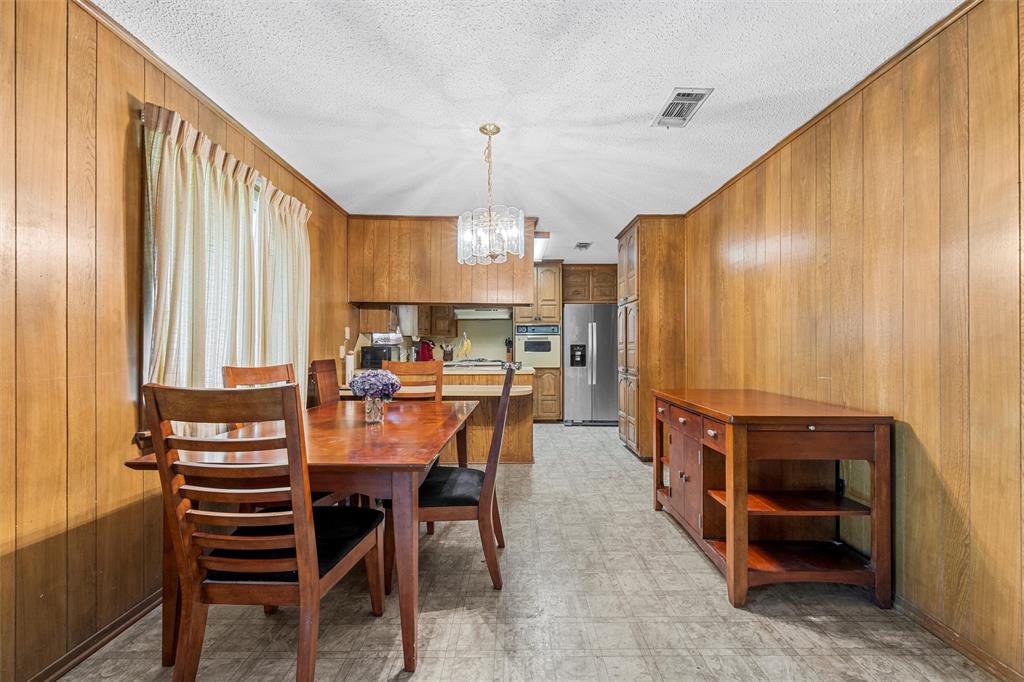 300 Travis Lane Hewitt, TX 76643 - Photo 11 of 18 a view of a dining room with furniture window and outside view