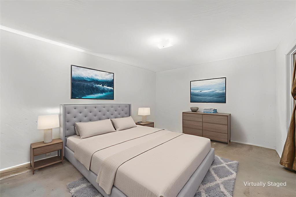 300 Travis Lane Hewitt, TX 76643 - Photo 17 of 18 a bedroom with a bed and a flat screen tv