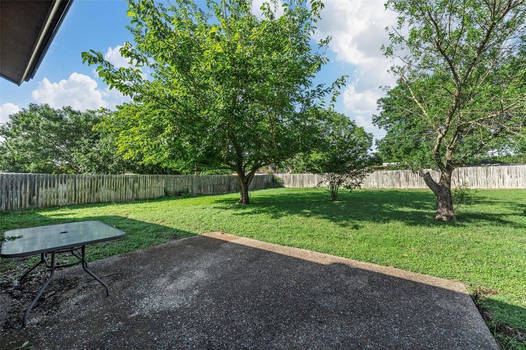300 Travis Lane Hewitt, TX 76643 - Photo 7 of 18 a view of a park with plants and trees