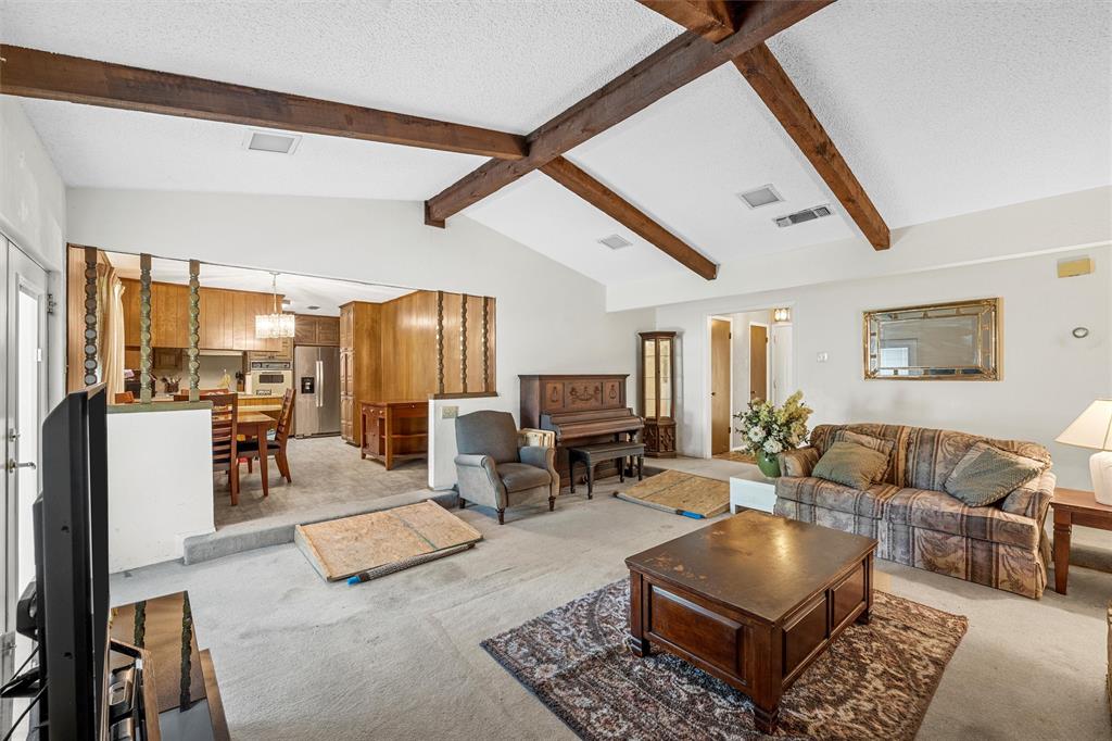 300 Travis Lane Hewitt, TX 76643 - Photo 8 of 18 a living room with furniture and a table