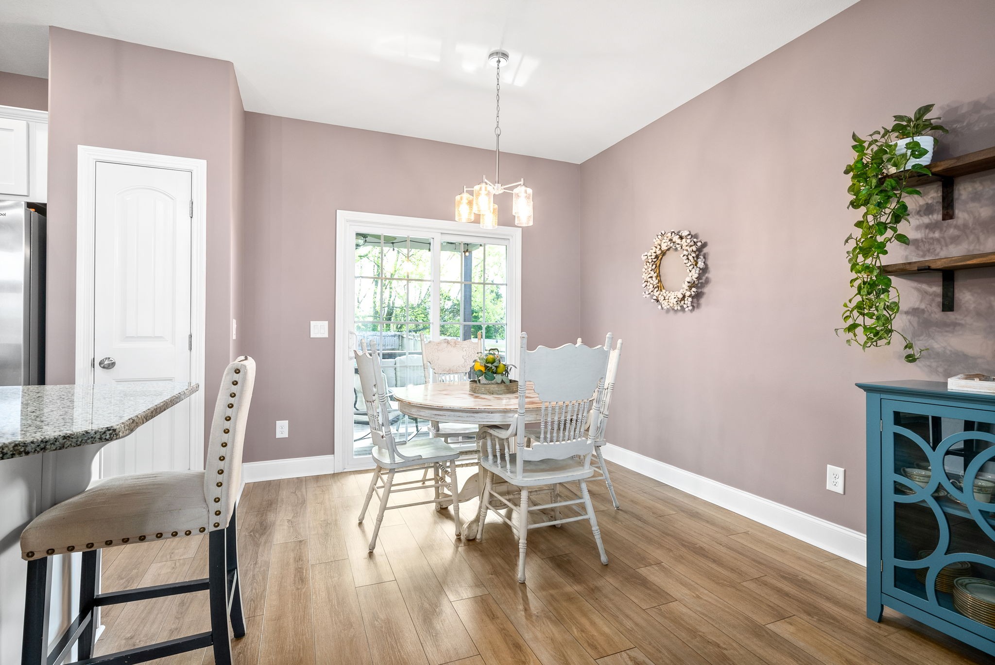 2251 Allen-Griffey Road Clarksville, TN 37042 - Photo 15 of 31 a view of a dining room with furniture window and wooden floor