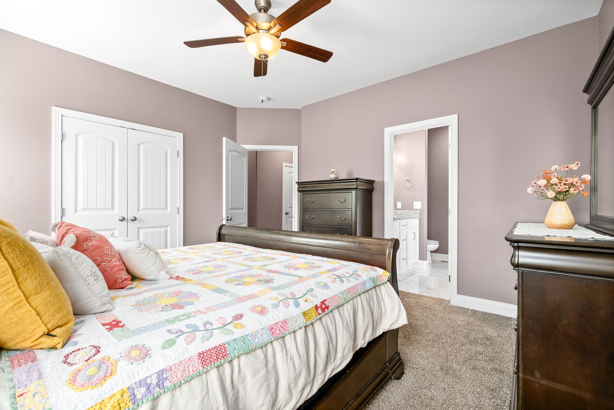 2251 Allen-Griffey Road Clarksville, TN 37042 - Photo 18 of 31 a bedroom with a bed and a chandelier