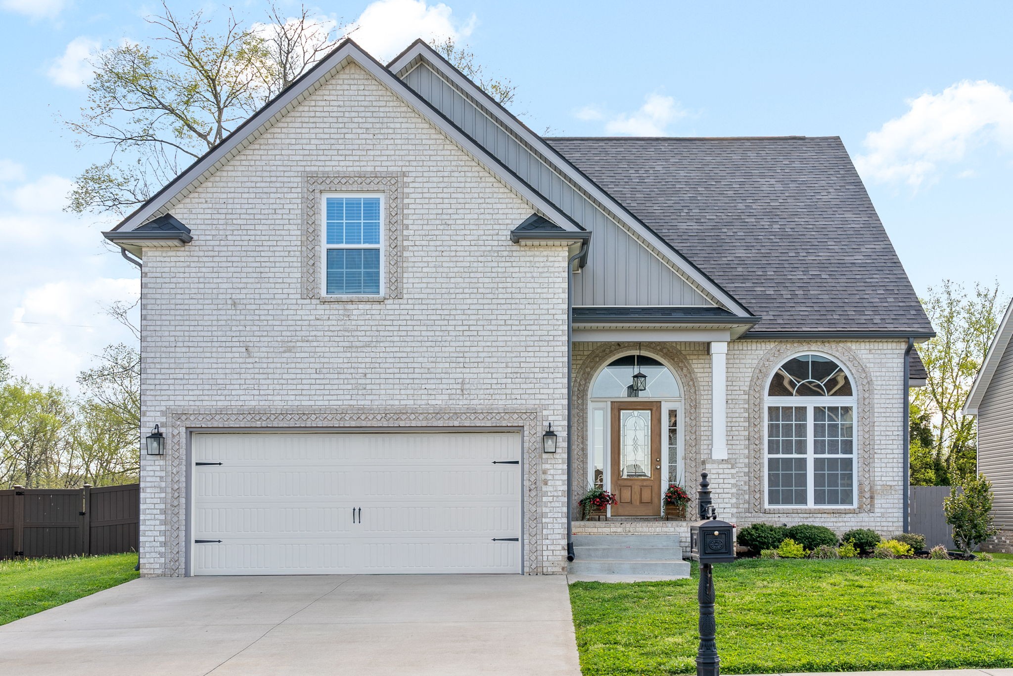 2251 Allen-Griffey Road Clarksville, TN 37042 - Photo 2 of 31 a front view of a house with garden