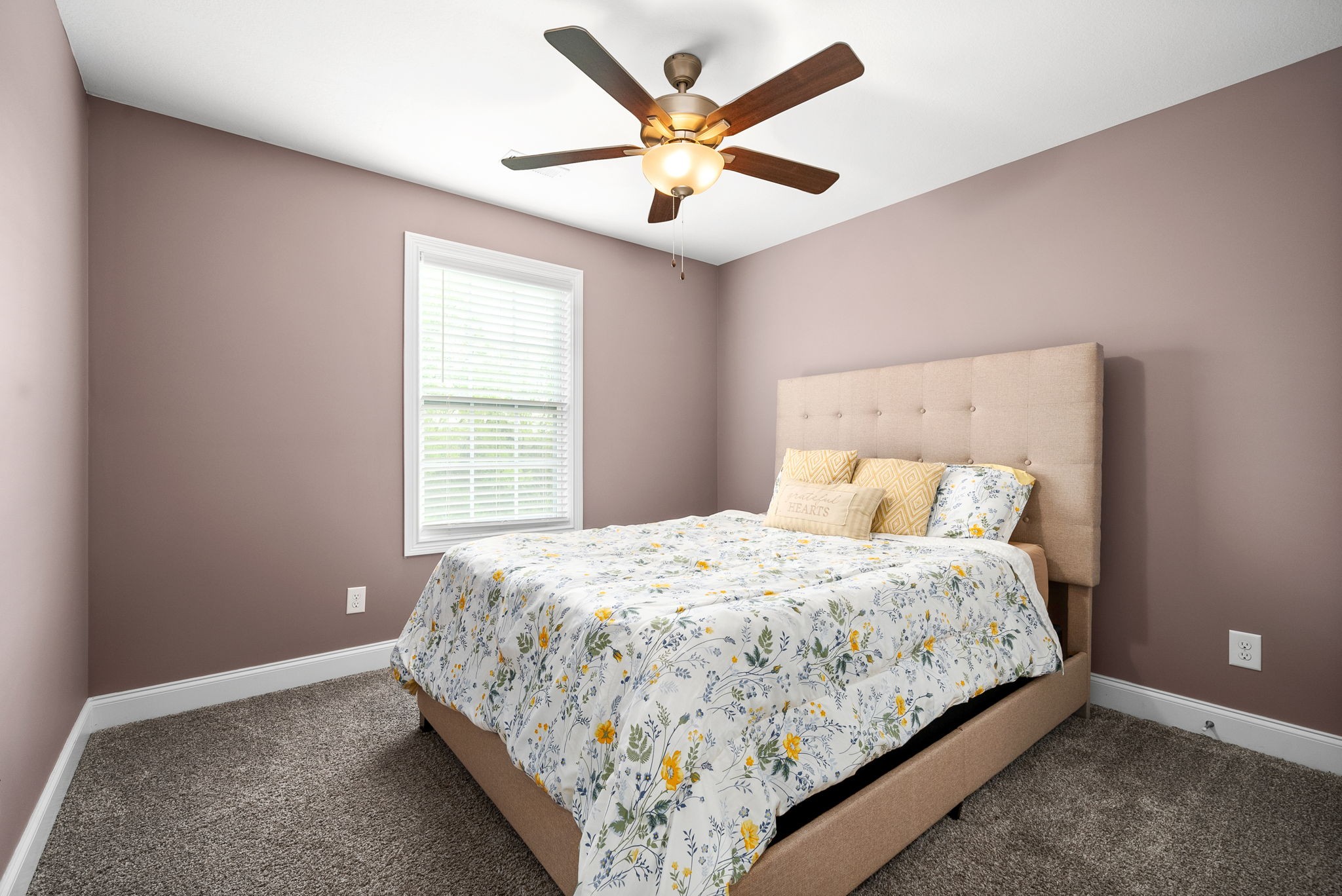 2251 Allen-Griffey Road Clarksville, TN 37042 - Photo 22 of 31 a bed sitting in a bedroom next to a window