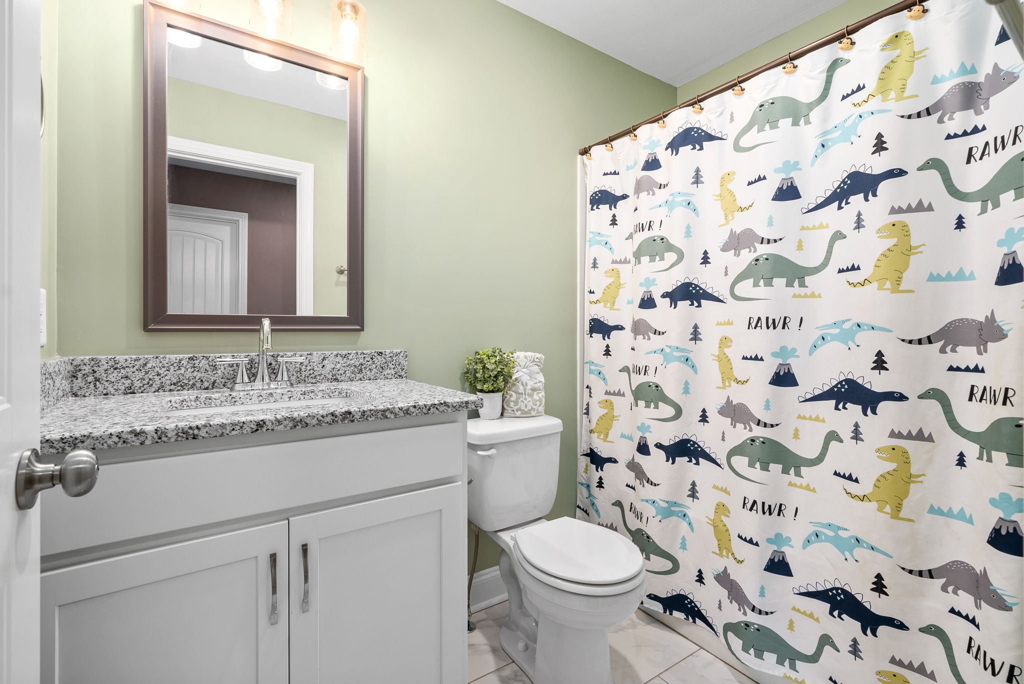 2251 Allen-Griffey Road Clarksville, TN 37042 - Photo 24 of 31 a bathroom with a granite countertop sink a toilet and a mirror