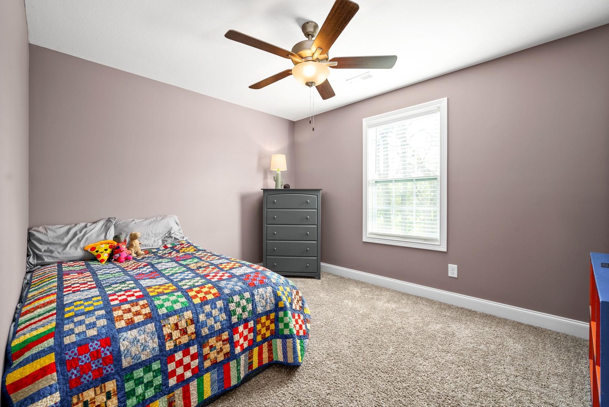 2251 Allen-Griffey Road Clarksville, TN 37042 - Photo 25 of 31 a bedroom with a bed and a chandelier