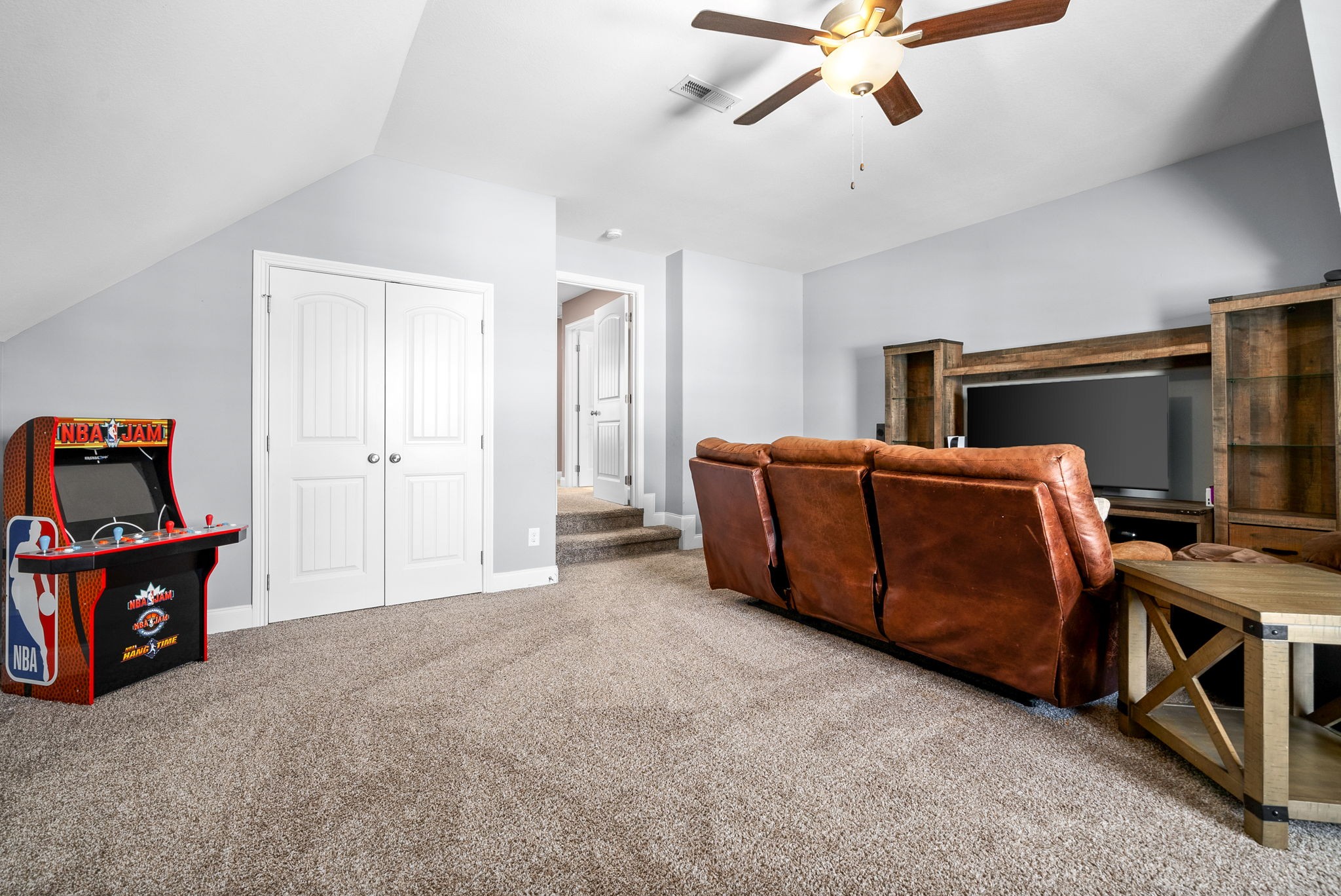 2251 Allen-Griffey Road Clarksville, TN 37042 - Photo 26 of 31 a living room with furniture and a flat screen tv