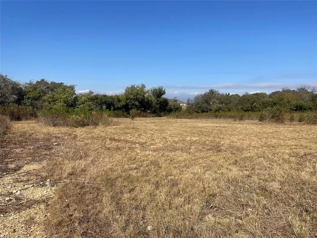 a view of a lake with mountains in the background