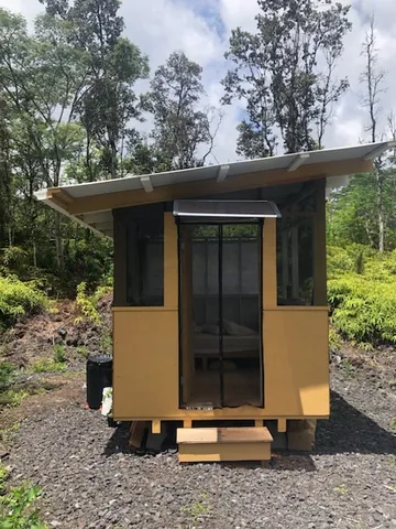 a front view of house with a yard