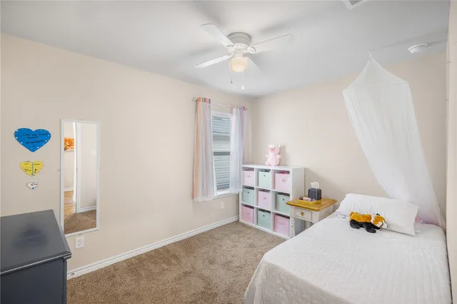 a living room with furniture fireplace and a flat screen tv