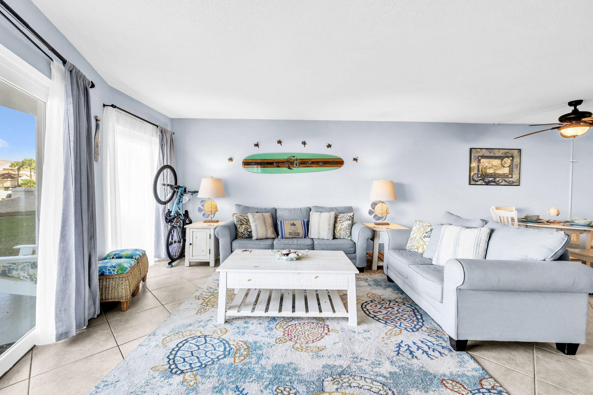 909 Santa Rosa Boulevard, Unit 515 Fort Walton Beach, FL 32548 - Photo 16 of 49 a living room with furniture and wooden floor