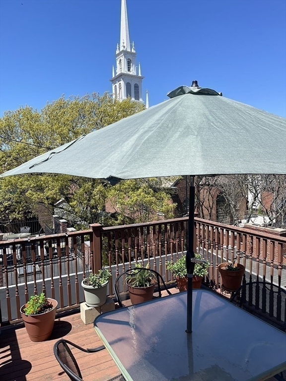 26 Unity Street, Unit 5 Boston, MA 02113 - Photo 11 of 15 a view of a terrace with couches