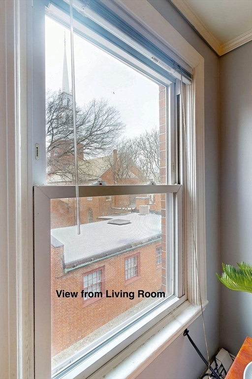 26 Unity Street, Unit 5 Boston, MA 02113 - Photo 4 of 15 a view of a glass door with a glass door