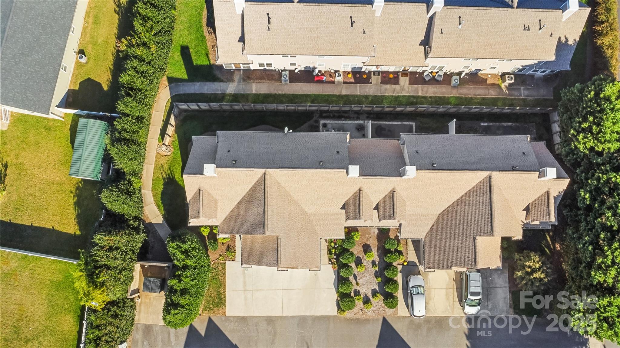 1553 16th Avenue Northeast, Unit 7 Hickory, NC 28601 - Photo 29 of 32 an aerial view of a house with a yard and lake view