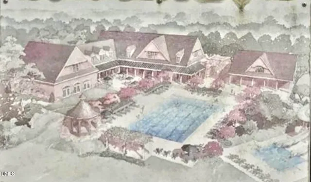 a view of house with a trees in the background