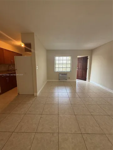 a view of a livingroom with a staircase