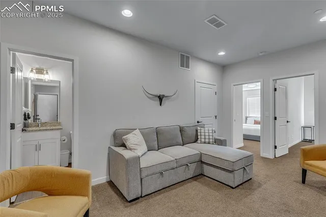 a living room with furniture and a couch