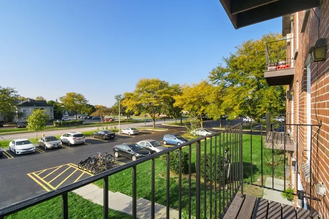 a view of swimming pool from a balcony