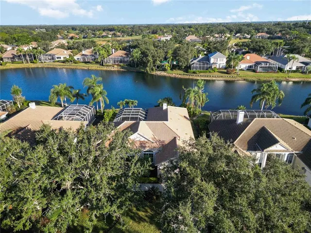 a view of a swimming pool with a lounge chair