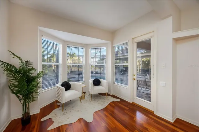 a room with gym equipment and a large window