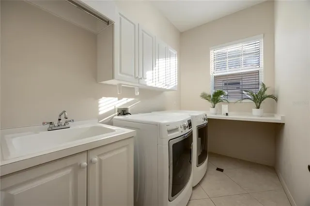 a view of a balcony with wooden floor and fence
