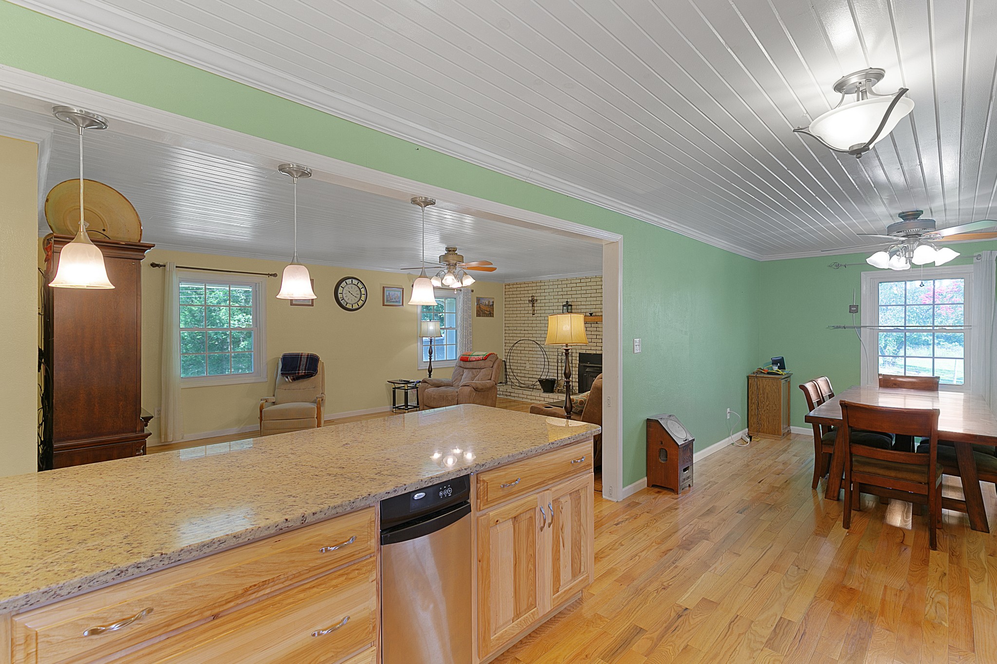 735 Benson Road Reagan, TN 38368 - Photo 8 of 48 a view of a dining room with furniture and wooden floor